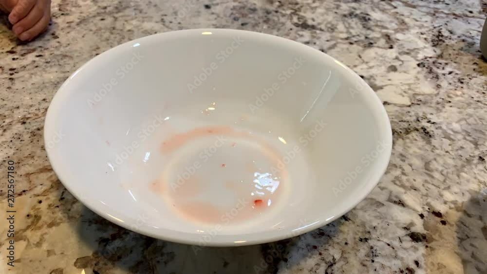 A bowl of fresh clean strawberries gone in 5 seconds. A bowl of fresh clean strawberries gone in 5 seconds.