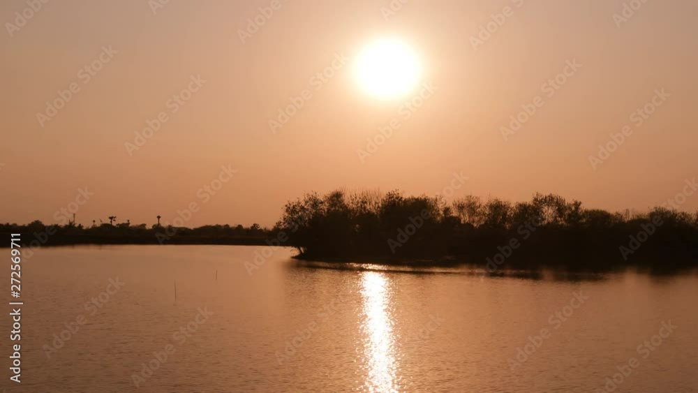 Dramatic stormy scenery countryside at reservoir and beautiful clouds ,landscape timelapse on Sunset Dramatic stormy scenery countryside at reservoir and beautiful clouds ,landscape timelapse on Sunset