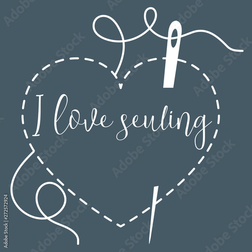 Stitched heart and needle with thread. Sewing