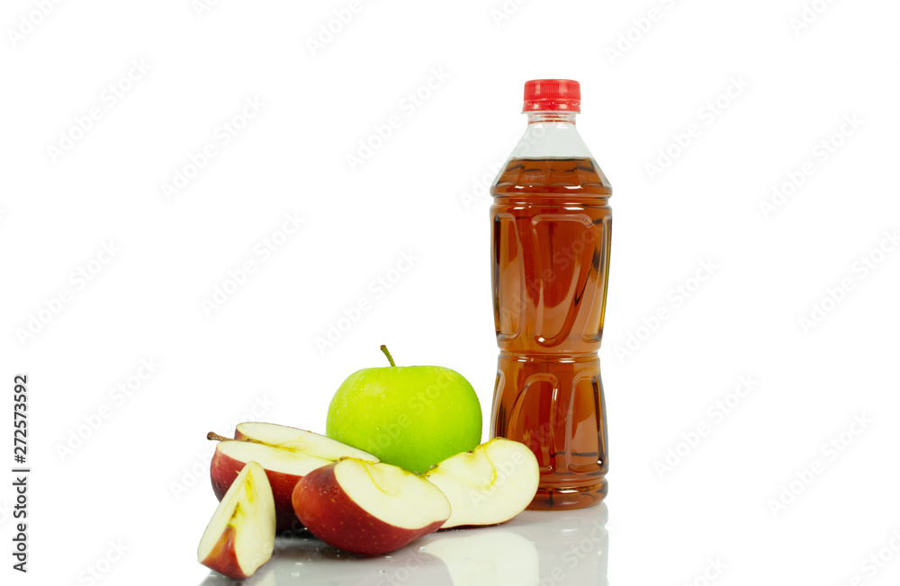 apple and bottle on white background. apple and bottle on white background.