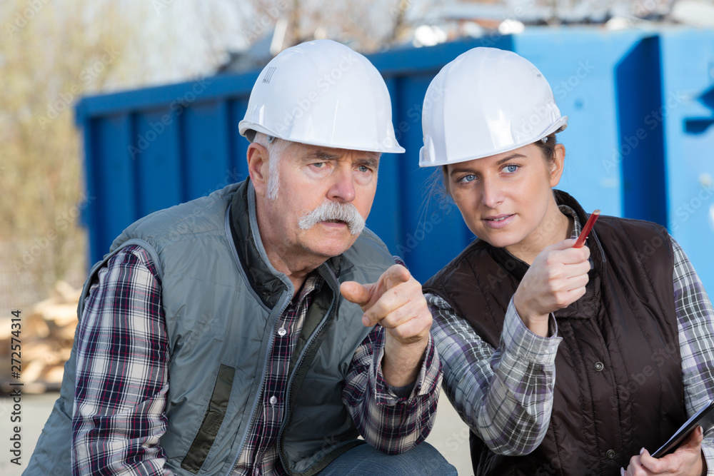 environmental workers thinking of a plan environmental workers thinking of a plan