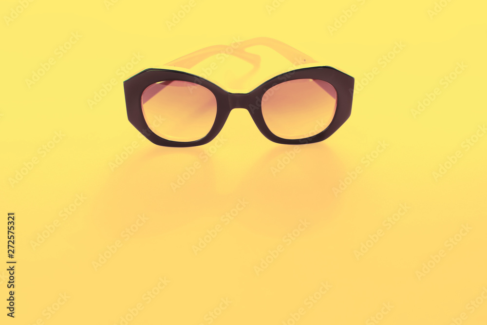 Woman's Sun Glasses YellowBackground Flat Single Woman's Sun Glasses YellowBackground Flat Single