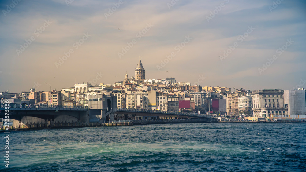 Naklejka premium Galata Bridge, Karakoy district and Golden Horn with famous Galata Tower on the background, istanbul - Turkey