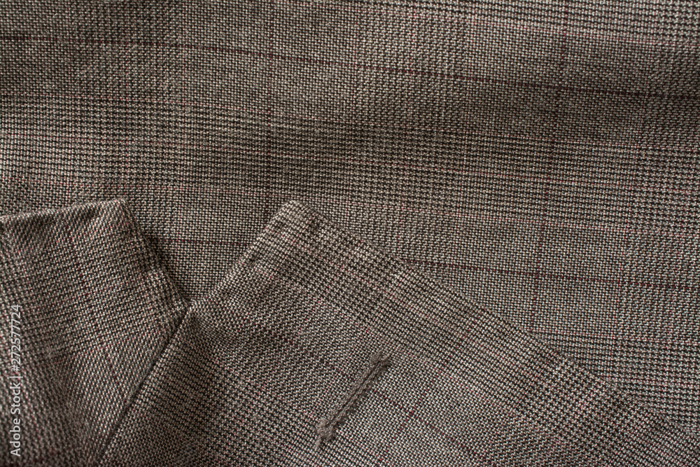 Detail of a man's business suit. Tailoring background Detail of a man's business suit. Tailoring background