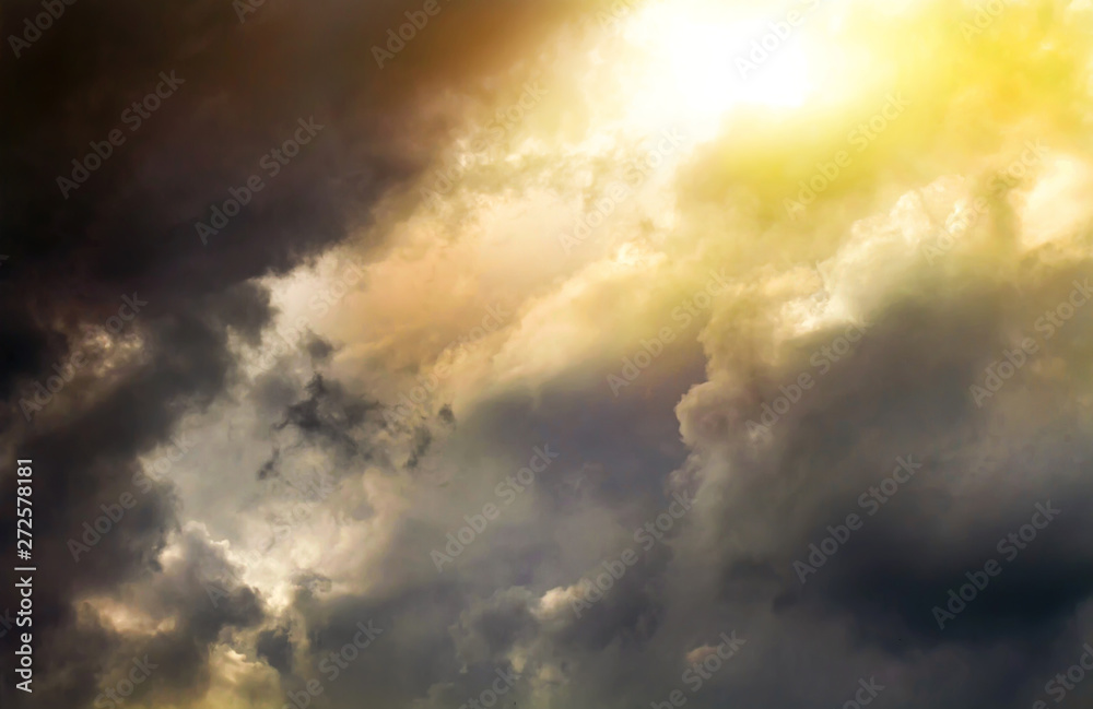Sunlight breaks through storm clouds. Nature is waiting for a thunderstorm. Sunlight breaks through storm clouds. Nature is waiting for a thunderstorm.