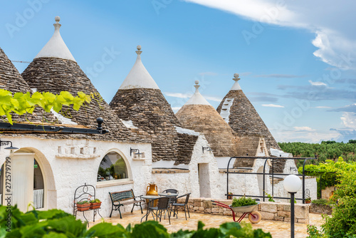 Trulli of the Itria valley. Details in the sky. Puglia, Italy. photo
