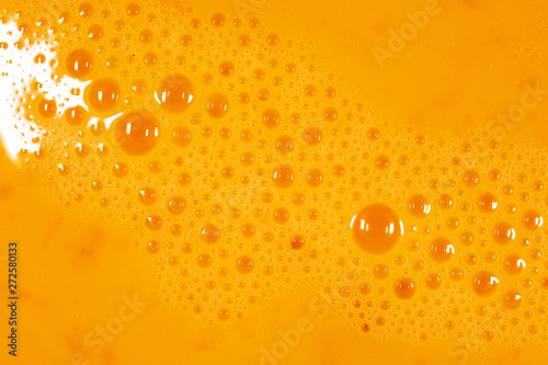 Whipped yolk with eggs as an abstract background