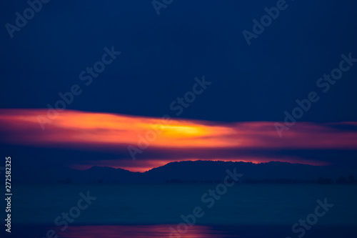 seascape of sunset sky and rain clouds