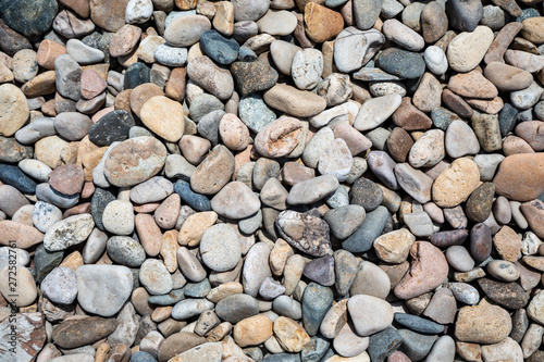 Closeup beach cobblestone texture background
