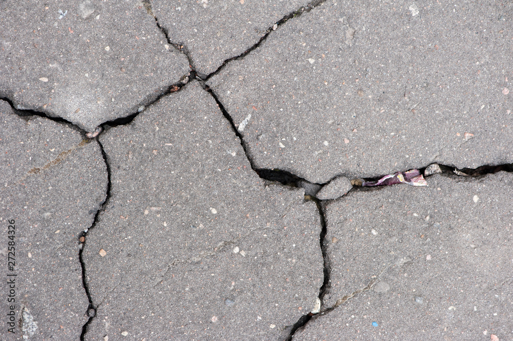 Obraz premium Texture of cracked asphalt