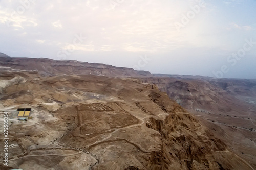 aerial view of the ruins of roman camp at the masada fortress in the arava valley in israel. Historical ruins. Archaeological excavations in the desert photo