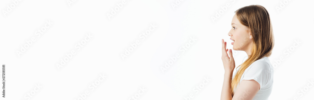 side view of surprised teenage girl isolated on white, panoramic shot side view of surprised teenage girl isolated on white, panoramic shot