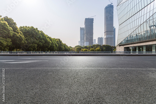 Obraz na plátne Panoramic skyline and modern business office buildings with empty road,empty con