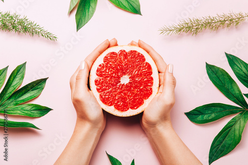 Female's hands holding grap...