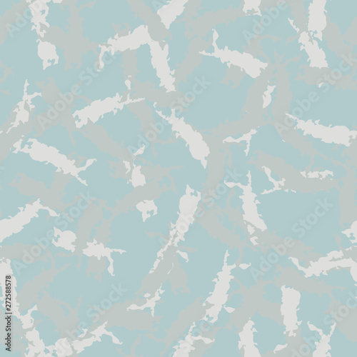 Winter camouflage of various shades of grey  blue and white colors