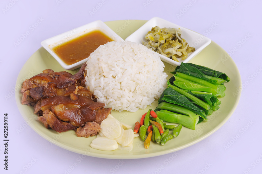 Rice with pork legs,Thai food on white background Rice with pork legs,Thai food on white background