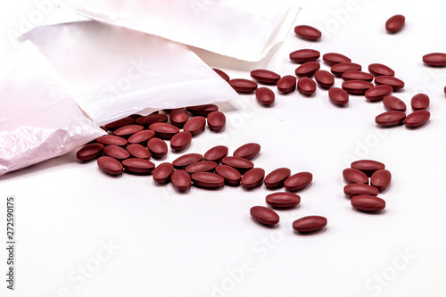 Ferrous Fumarate pills with Vitamins for treat iron deficiency anemia isolate on white background. photo