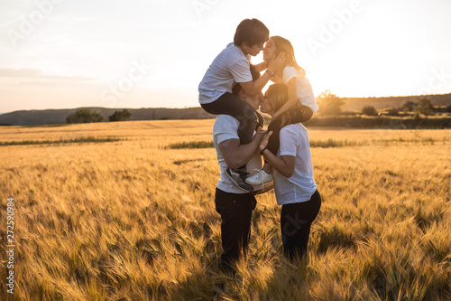 Portrait of a happy and fun family in the countryside. Concept of love family