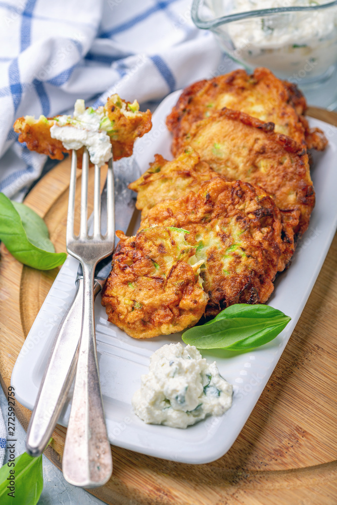 Plate with fritters from zucchini. Plate with fritters from zucchini.
