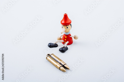 Bullet and wooden pinocchio...