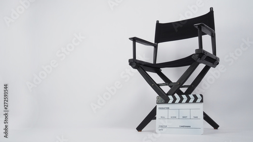 Clapper board or movie slate with director chair use in video production or m...