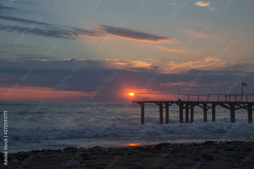 Exotic Paradise, sunset. Travel, Tourism and Vacations Concept. black sea Jetty on the beach Batumi