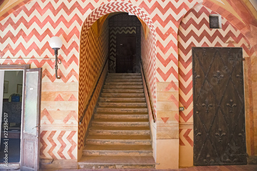 Internal staircase of the Castle of Sartirana, in Lomellina in Italy photo