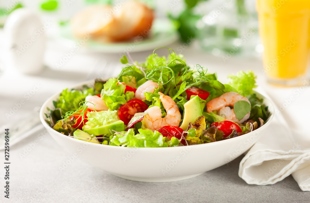 Fresh summer salad with shrimp, avocado and tomato Fresh summer salad with shrimp, avocado and tomato