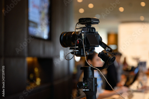 Tableau sur toile Mirrorless camera with mic wireless on gimbal stabilizer