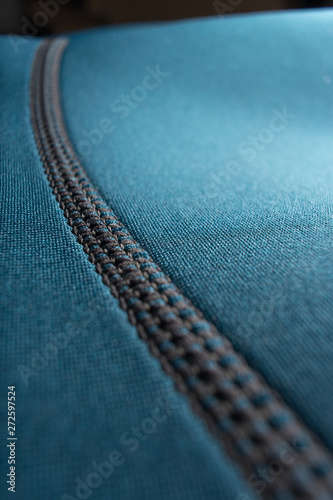 Close up of a blue neoprene scuba diving / surfing wetsuit photo