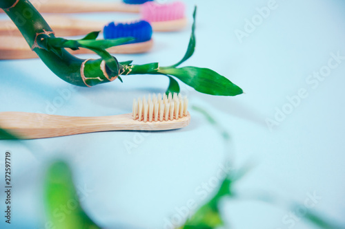 Flat lay composition with bamboo toothbrush and space for text