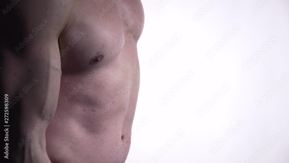 Close up profile shot of a man lifting dumbbell on white background, 4k Close up profile shot of a man lifting dumbbell on white background, 4k