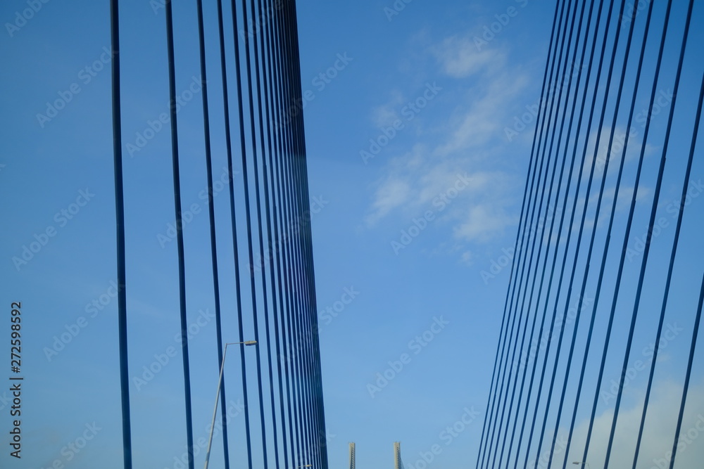 Abstract view of Bridge building architecture landmark with blue sky and cloud Abstract view of Bridge building architecture landmark with blue sky and cloud