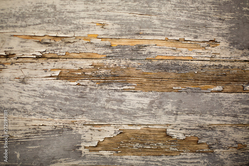 Old wooden background. Brown scratched wooden board