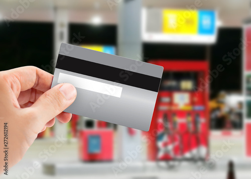 Credit card to make a payment for refueling car on gas station