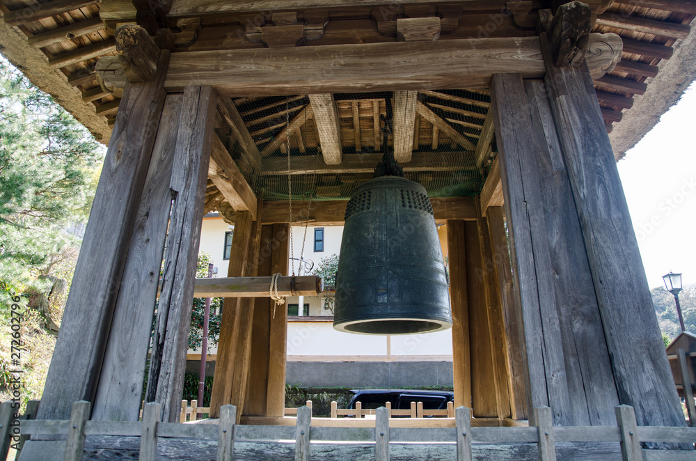 Ancient temple bell in the Zen Buddhist Temple at Kamakura, Japan Ancient temple bell in the Zen Buddhist Temple at Kamakura, Japan