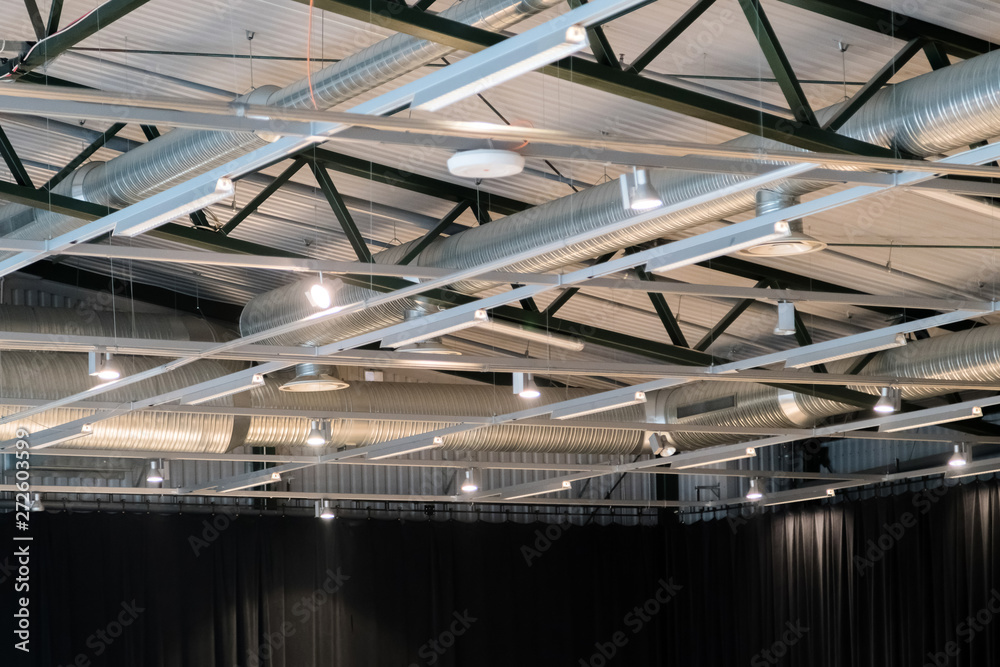 Factory building or warehouse building. Vast empty space with ve Factory building or warehouse building. Vast empty space with ve