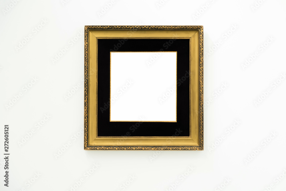 Blank empty golden frame on white background. Art gallery, museu Blank empty golden frame on white background. Art gallery, museu