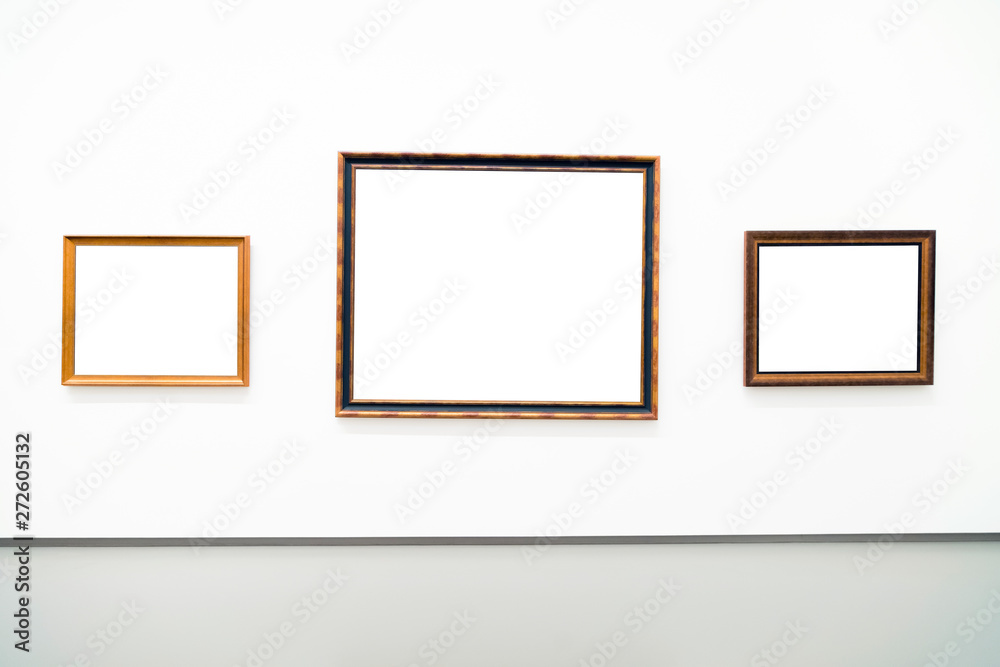 Blank empty golden frame on white background. Art gallery, museu Blank empty golden frame on white background. Art gallery, museu