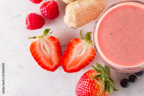 Delicious red smoothie with strawberry
