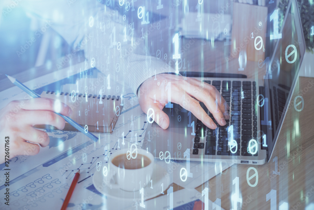 Multi exposure of data internet theme hologram with man working on computer on background. Concept of innovation. Multi exposure of data internet theme hologram with man working on computer on background. Concept of innovation.