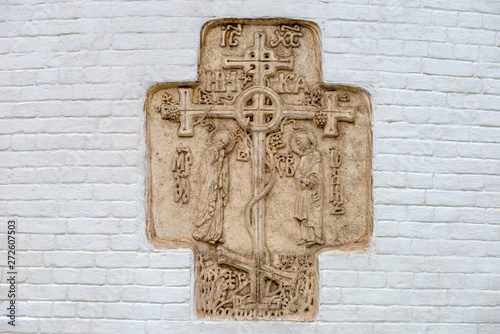 Cross on the wall of the Intercession Cathedral. Marfo-Mariinsky Convent of Mercy. Moscow photo