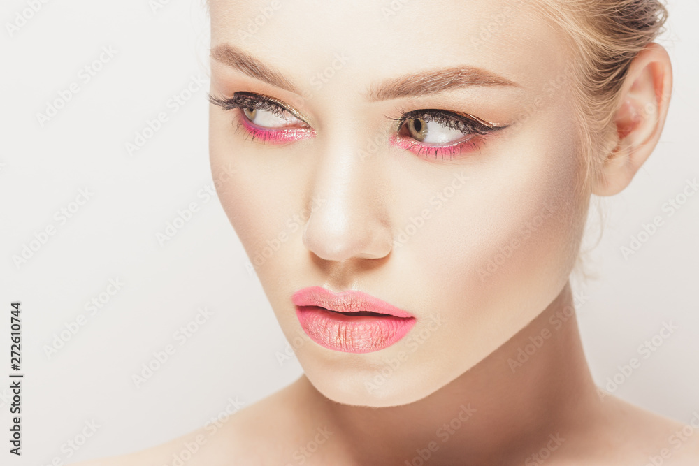 Portrait of beautiful woman with make up, studio shoot Portrait of beautiful woman with make up, studio shoot