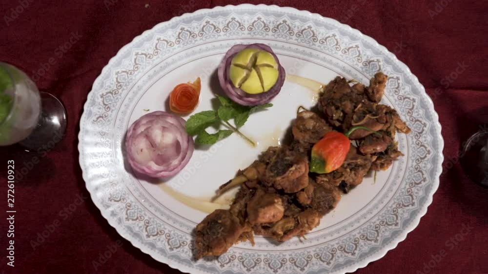 Grilled Chicken and Two Cocktail Drinks on Red Table Cloth Zoom In Shot Grilled Chicken and Two Cocktail Drinks on Red Table Cloth Zoom In Shot
