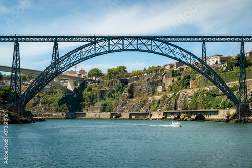 Embankment of Douro River with Bridge of Luis I and Prince Henry © CrispyMedia