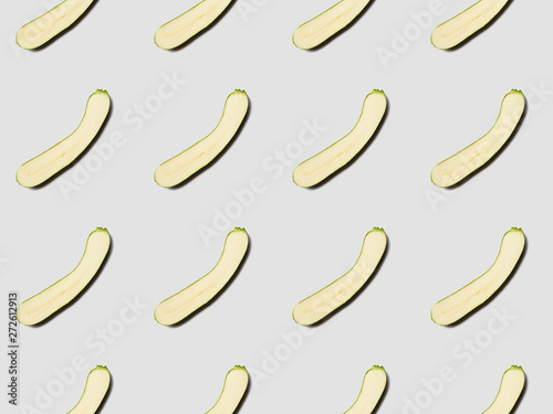 top view of zucchini slices on white background, seamless pattern
