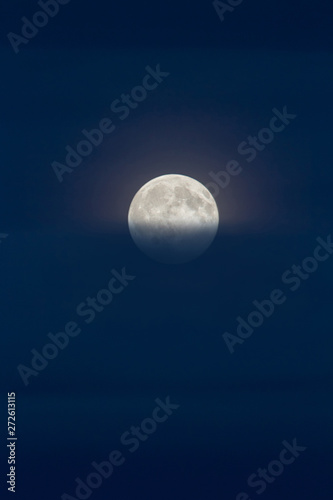 Full moon on dark blue sky © CrispyMedia