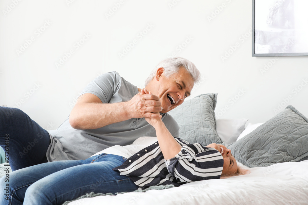 Portrait of mature couple having fun at home Portrait of mature couple having fun at home
