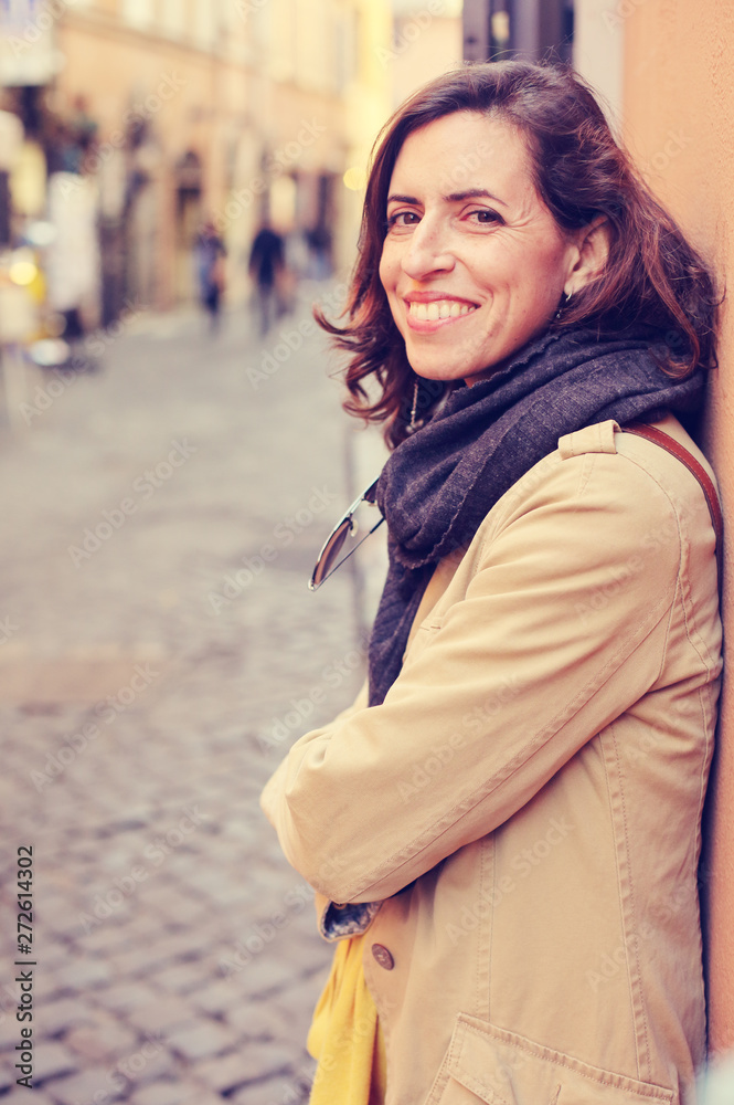 Outdoor portrait of happy smiling  mature woman