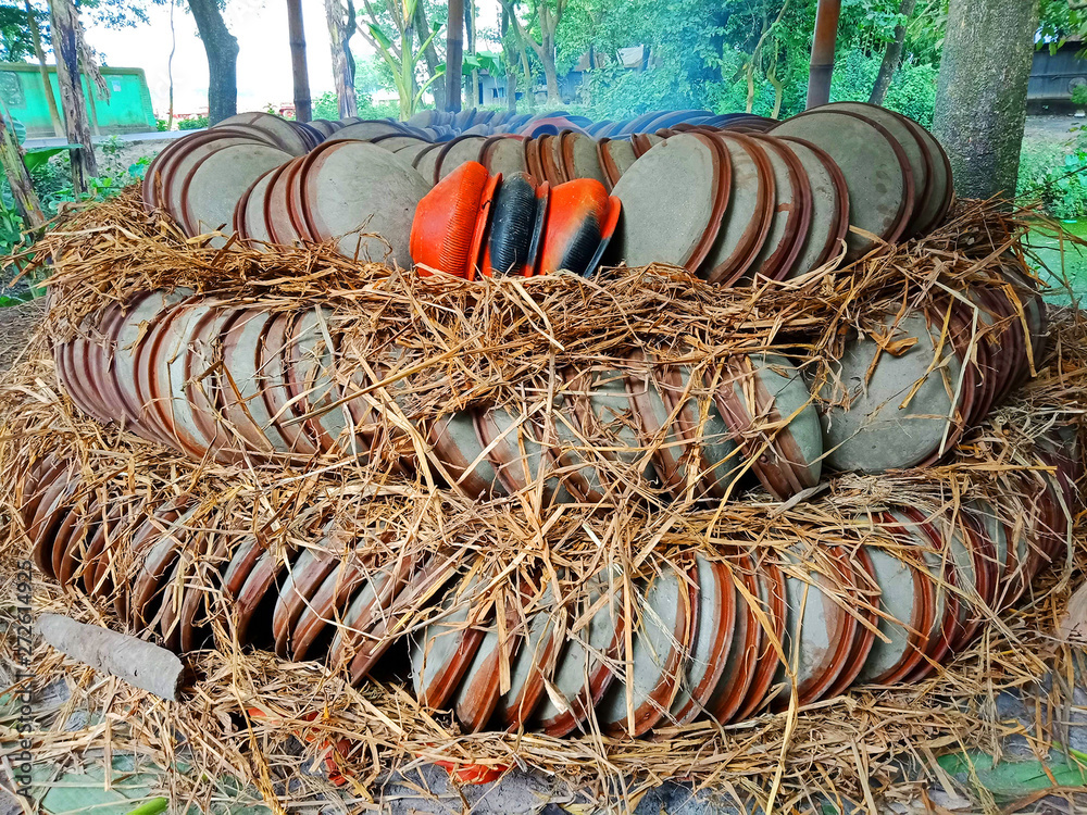 Process of drying the traditional clay pottery items in a fire dome
